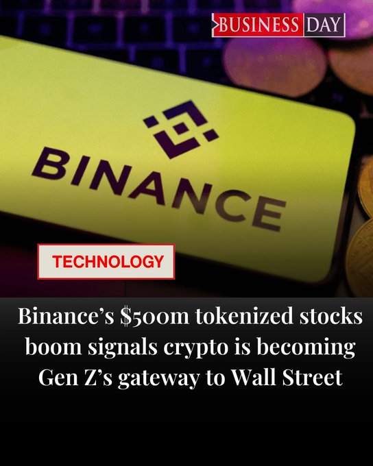 A smartphone displaying the Binance logo rests on a keyboard beside coins, with the headline "Binance's $500m tokenized stocks boom signals crypto is becoming Gen Z's gateway to Wall Street" and a "Business Day Technology" tag, illustrating the rapid growth of the bStocks platform that has reached $500 million in AUM within seven weeks of launch.