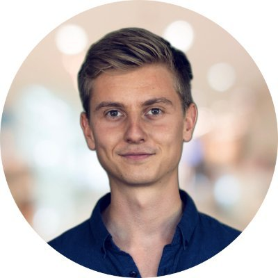 A circular portrait of a young blonde man in a dark blue shirt, smiling subtly against a softly blurred background. The image complements the post's caption by suggesting the "guy" who sparked FOMOOMO (fear of missing out) with his quick $100K earnings.