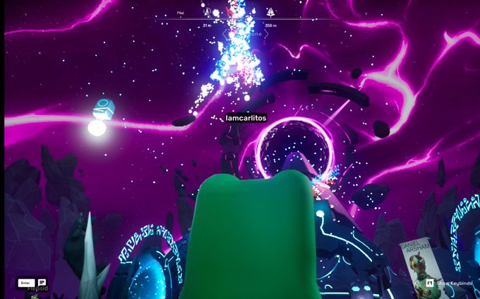 A first-person view from a sci-fi video game showing a purple-hued cosmic environment with stars, glowing rings, and floating rocks, with the username 'Iamcarititos' displayed.