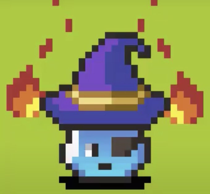 Pixel art illustration of a character wearing a purple wizard hat with a gold band, surrounded by flames on a green background.