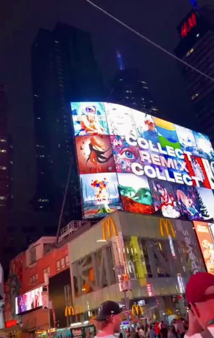 A nighttime photograph of Times Square featuring a large H&M billboard displaying 'COLLECT REMIX COLLECT' NFTs above a McDonald's restaurant, with pedestrians visible below.