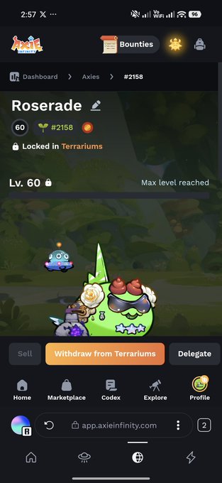 Mobile game screenshot from Axie Infinity showing a Level 60 'Roserade' Axie (#2158) with options to 'Sell', 'Withdraw from Terrariums', or 'Delegate'.