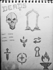 A pencil sketch in a spiral notebook titled 'DEADS' showing a collection of gothic and fantasy symbols including a skull, gravestone, dagger, rose, keyhole, and flame chalice, with handwritten labels.