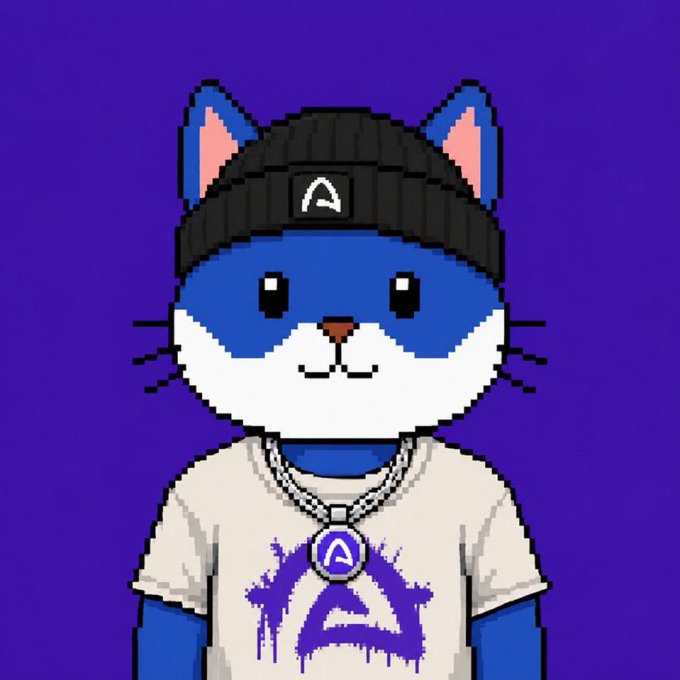 A pixel art image of a blue and white cat wearing a black beanie and a white t-shirt with a blue "A" logo, also wearing an "A" pendant, against a purple background.