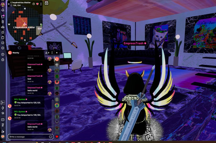 A screenshot of a Decentraland virtual world scene at 'L'Impératrice Atelier,' featuring an avatar with large black and yellow wings carrying a sword, with a chat panel showing messages from 'EmpressTrash' and DCL System teleportation notifications.