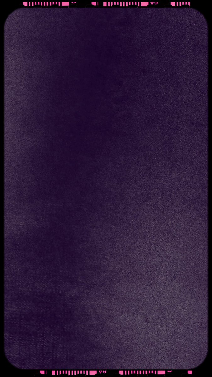 The image shows a purple cell phone screen with a pink border. There are no texts or other objects visible in the image. The focus of the image is on the cell phone, which appears to be turned off.