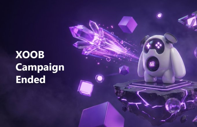 The image shows a purple background with various shapes and objects scattered throughout, including cubes, spheres, and crystals. In the center of the image, there is a white cartoon character that appears to be a robot or a monster. The text "XOOB Campaign Ended" is written in black at the bottom of the image.