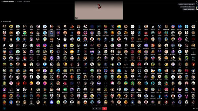 A screenshot showing a large video call or online community with numerous participant profile pictures arranged in a grid layout, with one active speaker visible at the top.