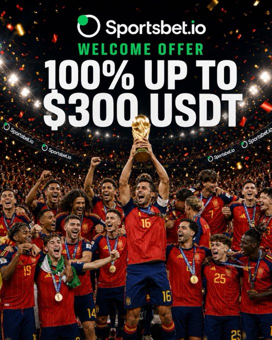 The image shows the Spanish national football team celebrating with the FIFA World Cup trophy amid confetti, overlaid with a Sportsbet.io advertisement promoting a "WELCOME OFFER: 100% UP TO $300 USDT." This ties into the post by connecting the excitement of the World Cup tournament, which the user enjoyed betting on through Sportsbet.io, with their current welcome bonus offer as club football returns.