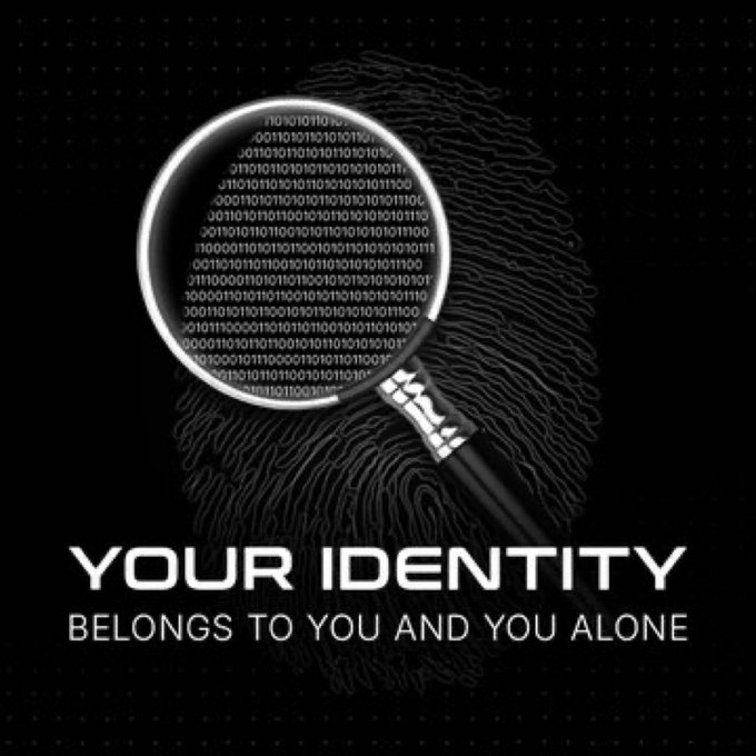 Digital security concept image showing a magnifying glass over a fingerprint made of binary code, with text reading 'YOUR IDENTITY BELONGS TO YOU AND YOU ALONE.'