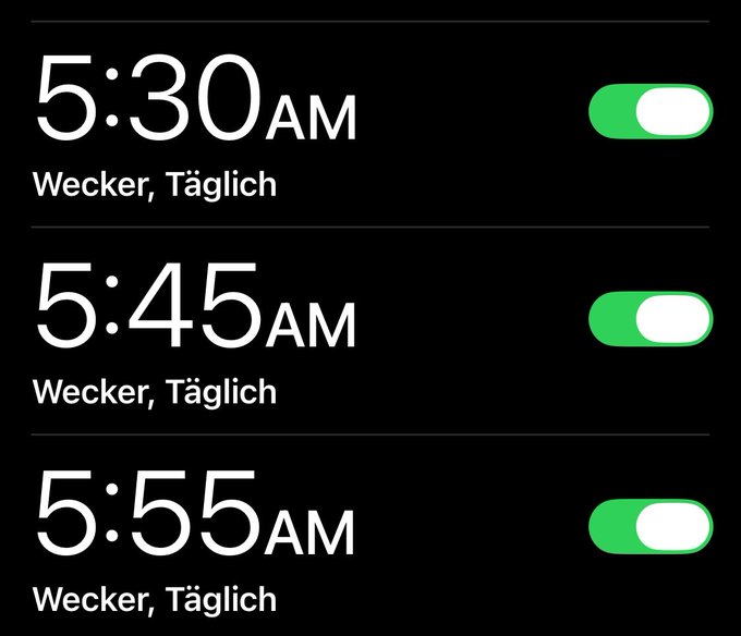 An iPhone alarm screen in German displaying three daily alarms set for 5:30 AM, 5:45 AM, and 5:55 AM, each labeled "Wecker, Täglich" and toggled on.