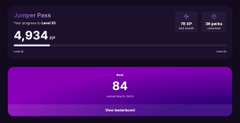 A dark-themed fitness or health dashboard displays metrics for 'Jumper Press' at 4,934 lbs and a benchmark score of 84 in purple.