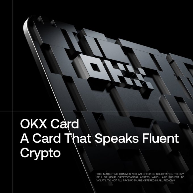A sleek promotional image featuring a metallic black OKX card angled dramatically against a dark background, with the "OKX" logo embossed in geometric patterns. The tagline reads "OKX Card - A Card That Speaks Fluent Crypto," with small disclaimer text below noting the marketing communication is not an offer or solicitation to buy crypto, which aligns with the partnership announcement promoting OKX's trading platform sign-up.