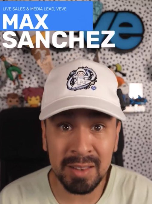 The image features a man wearing a white baseball cap, smiling at the camera while posing for a photo. The caption below his picture reads "A VeVe fan is now officially on the team Max Sanchez @HomiesOmi stepping in as Live Sales & Media Lead is proof that web3 can work differently". This suggests that the man's involvement with the gaming community has influenced or inspired the creation of this image, possibly for a promotional or marketing purpose.