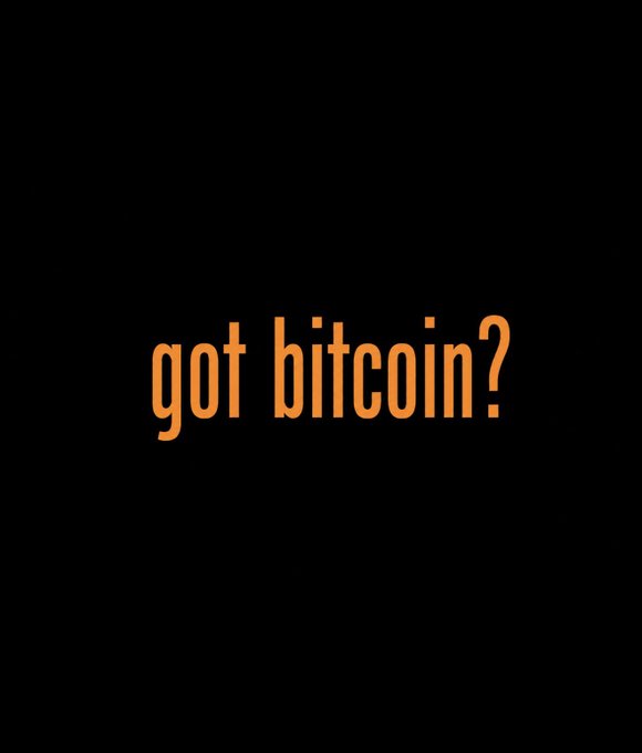 Orange text on a black background asks 'got bitcoin?' in a parody of the classic milk slogan.