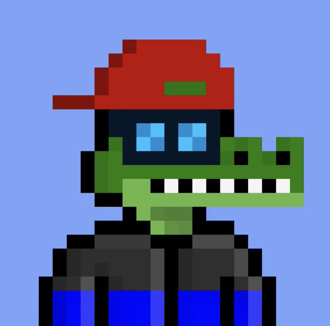 Pixel art character featuring a red baseball cap, green dinosaur/crocodile mask with white teeth, and blue clothing against a light blue background.