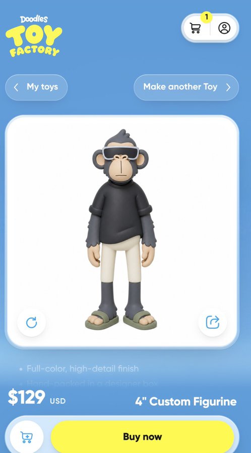 A mobile app screen from 'Doodles Toy Factory' displaying a 4-inch custom figurine of a monkey character wearing sunglasses and a black hoodie, priced at $129 USD with a 'Buy now' button.