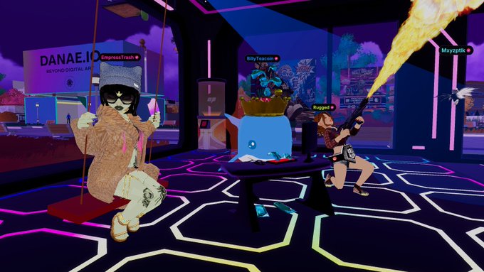 A screenshot from a virtual 3D environment (appearing to be a VRChat-style scene) showing avatars labeled "EmpressTrade" and "Ripper" in a neon-lit space with a "DANAE.IO" sign and an Ethereum-themed character.