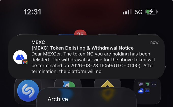 An iOS lock screen notification from MEXC at 12:31 reads '[MEXC] Token Delisting & Withdrawal Notice', stating that the token NC will be delisted and withdrawal terminated on 2026-08-23.