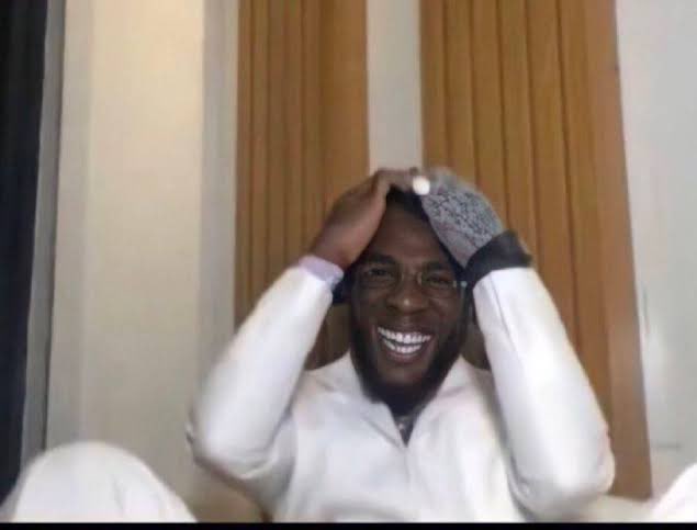 A man joyfully hugs an ice pack to his head, laughing. The image humorously relates to the post about $PI's dramatic decline from gaining 1k comments to fading into obscurity during the bear market, with the ice pack representing the "pain" of holding the coin.
