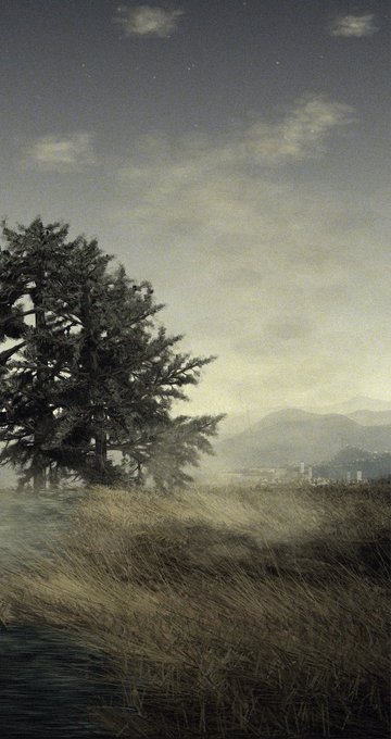 A moody landscape scene showing a dark silhouetted tree on the left overlooking a grassy field with mountains in the distant background under a cloudy sky, giving off a vintage or painterly aesthetic.