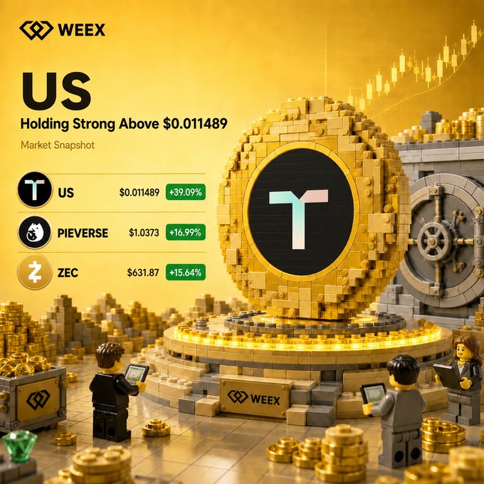 The image features a group of people standing around a golden coin, which appears to be a large Lego sculpture or model. The coin is placed in front of a building with a gold door, suggesting that they are gathered for an event related to cryptocurrency or financial markets. A person holding a tablet can also be seen in the scene. The post includes text about US currency and mentions Bitcoin, possibly indicating a connection between the golden coin sculpture and digital currency.