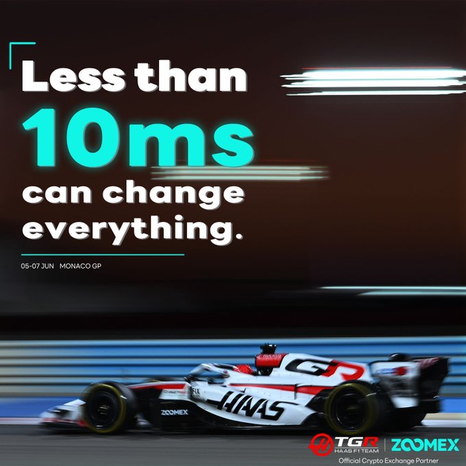 The image features a car racing scene with a driver inside, surrounded by a track. The text "less than 10ms can change everything" is displayed above the car, emphasizing the importance of timing in racing.