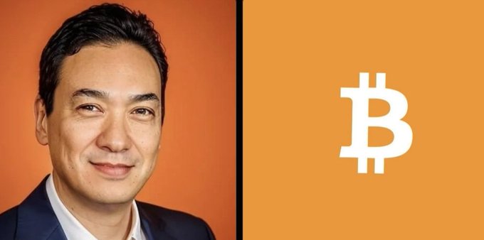 The image shows a headshot of Metaplanet CEO Simon Gerovich on the left against an orange background, paired with the Bitcoin "₿" logo on the right in white against the same orange backdrop. Together, the visuals reinforce the post's message about Gerovich's prediction that Asia—and specifically Japan—will drive the next major Bitcoin cycle.