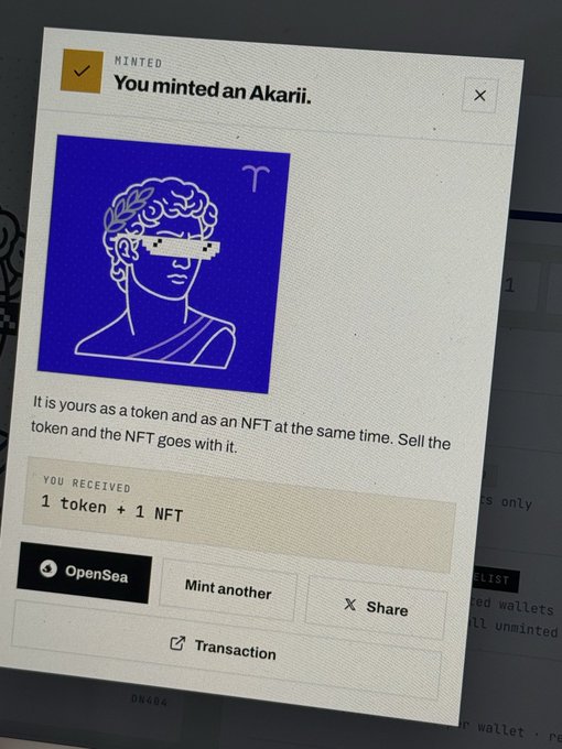 A screenshot showing a successful minting confirmation that reads 'You minted an Akarii,' featuring a blue digital illustration of a classical bust with a bar code over the eyes and the Aries zodiac symbol, indicating the user received '1 token + 1 NFT.'