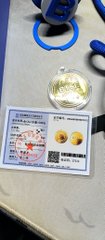 A "Mooncake" voucher from BTSE, displayed alongside two gold BTSE coins on a small dish, commemorating the Mid-Autumn Festival gifts shared with the community.