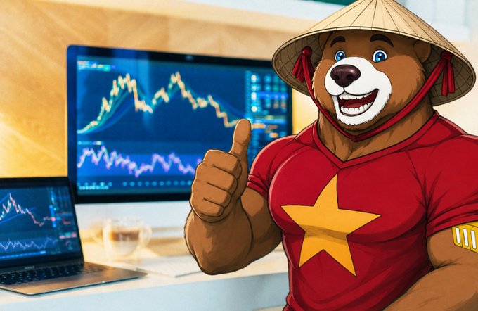 The image features a cartoon bear wearing a red shirt with a yellow star, giving off a happy vibe as he gives a thumbs up gesture. The background of the image shows a computer monitor displaying a graph or chart, possibly related to cryptocurrency prices. The caption at the bottom of the image reads "Tin tổc Crypto nổi bật trong ngày ơước: Bitcoin $BTC : Đang giữ mức - $76,500 - $77,350. Thị trường đang sideway, chờ tin vĩ mô. Tổng market cap: Khoảng กียง : $XRP & มาลนัดทองสมารบระมารปริมวัดกียง. Focus on what is in the image and how it relates to the post."