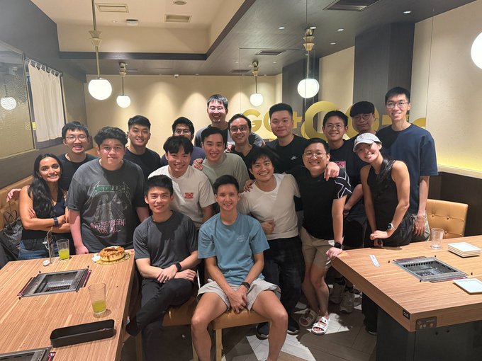A group of about 20 team members gather together at what appears to be a restaurant called "GONCHA" (visible in gold lettering in the background) for a celebratory photo. The image captures the team camaraderie on the author's last day at Jupiter, where they joined through the Coinhall acquisition when the company had 40 people and grew to 150+.
