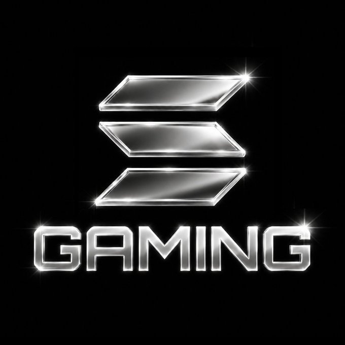 A metallic silver "GAMING" logo with three angled parallel bars above the text on a black background.