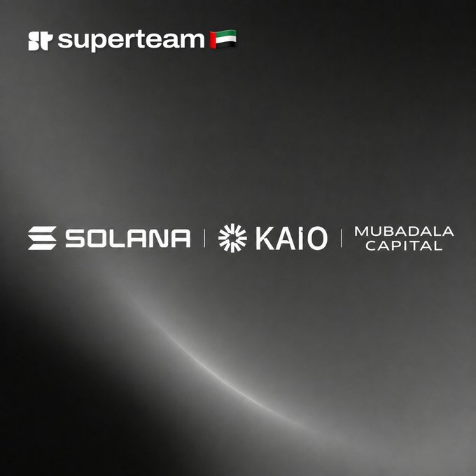 A dark promotional graphic featuring logos for 'superteam' (with a UAE flag), 'SOLANA', 'KAiO', and 'MUBADALA CAPITAL' against a black background.