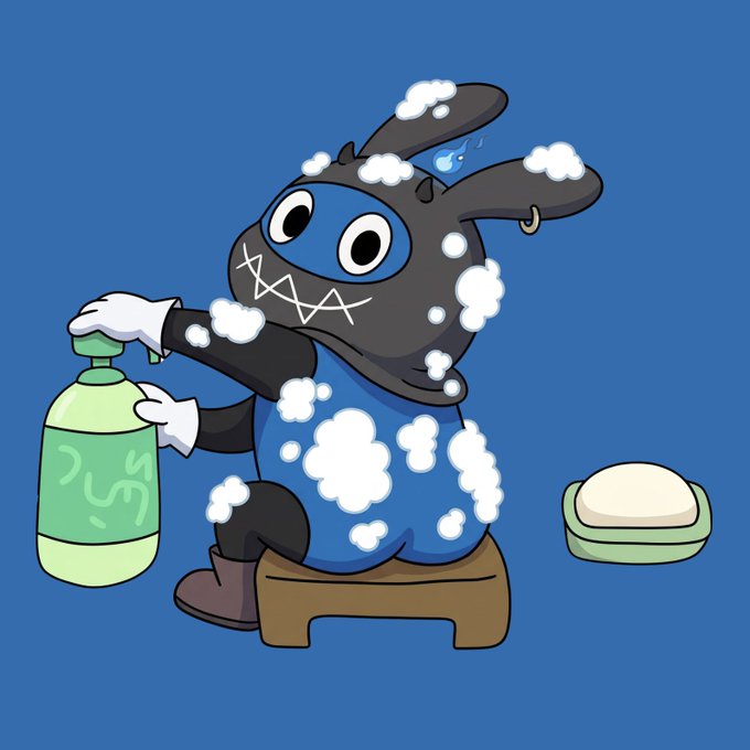 An animated black and blue rabbit-like character covered in soap bubbles holds a green bottle while sitting on a small stool next to a bar of soap, against a blue background.