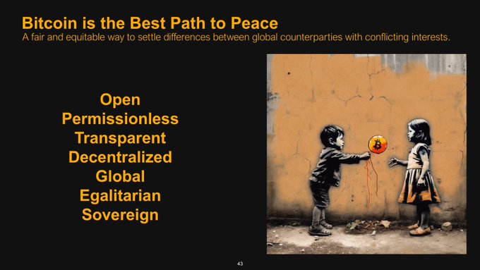 The image features a black and white photo of two children, one holding an orange balloon and the other holding a red balloon. The background shows a brick wall, which serves as a backdrop for the children's balloons. The caption below the photo reads "Bitcoin is the best path to peace", suggesting that Bitcoin can be used to spread love and positivity in the world.