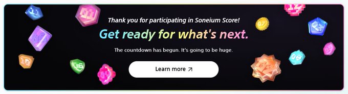A 'Thank you for participating in Soneium Score' message saying 'Get ready for what's next' with colorful gem-like icons scattered around and a 'Learn more' call-to-action button.