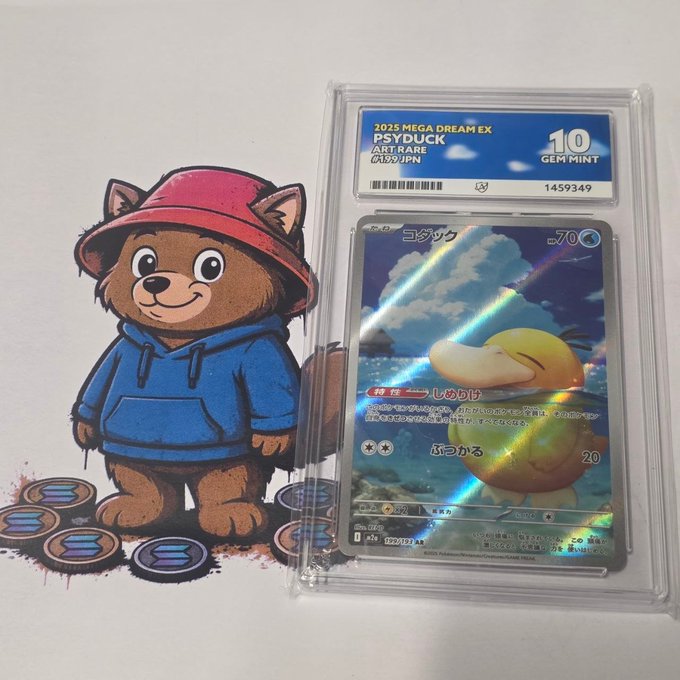 A graded 2025 Mega Dream EX Psyduck Art Rare card (PSA 10 GEM MINT, cert #1459349) sits beside a cartoon brown bear character wearing a red hat and blue hoodie, labeled "BERT," promoting a Pokémon card giveaway on BertCo.