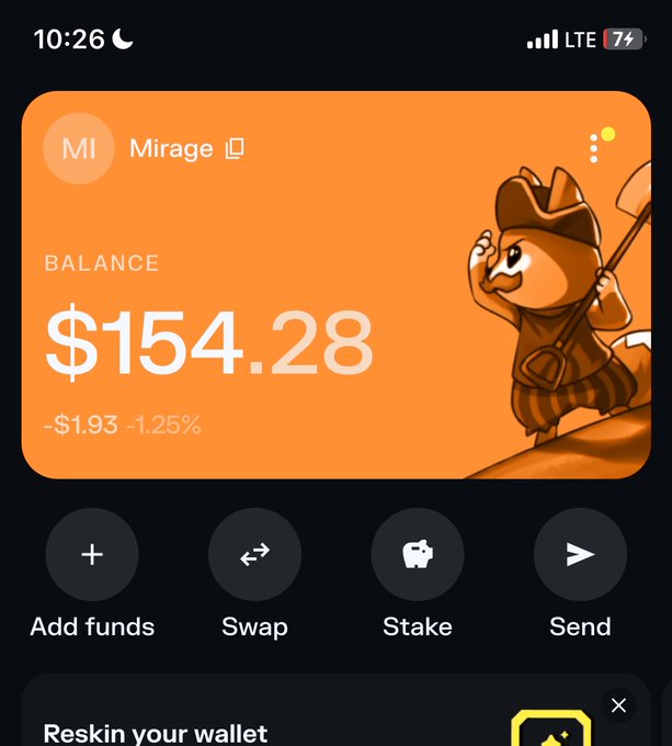 A mobile wallet screenshot showing a 'Mirage' account with a balance of '$154.28' (-$1.93, -1.25%) and an orange fox mascot character, with options to Add funds, Swap, Stake, and Send.