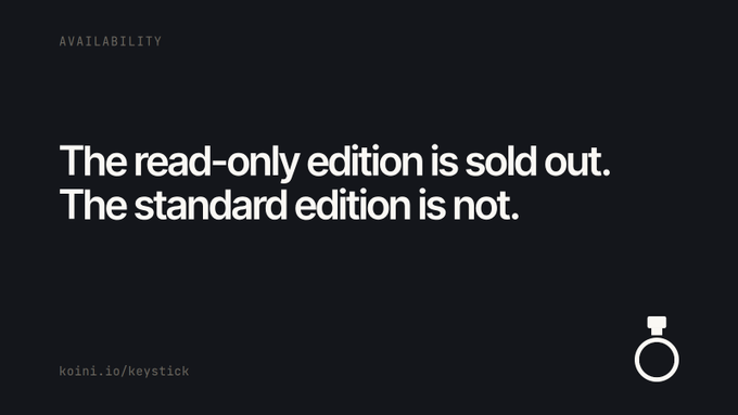 A minimalist dark-themed availability announcement stating 'The read-only edition is sold out. The standard edition is not.' with the URL 'koini.io/keystick' and a ring icon.