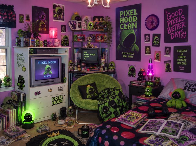 A vibrant purple and green themed room decorated with 'Pixel Hood Clan' merchandise, including posters reading 'PIXEL HOOD CLAN - JUST PIXELS REAL ONES' and 'GOOD PIXELS BETTER DAYS', featuring a CRT TV and numerous plush toys.