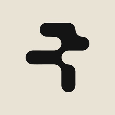 A stylized black letter "F" logo on a cream background, visually representing the RialoHQ brand being discussed in the post about the community's organic growth.