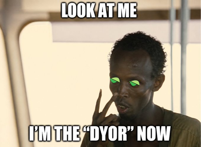 The image shows a meme of a gaunt man pointing at his own eyes, with cartoon green eyes overlaid and text reading "LOOK AT ME" at the top and "I'M THE 'DYOR' NOW" at the bottom. The post's commentary about "dyor" (do your own research) no longer meaning what it used to be ties into the meme's joke—humorously suggesting that centralized "cabal" figures have replaced genuine independent research by telling people what to buy.