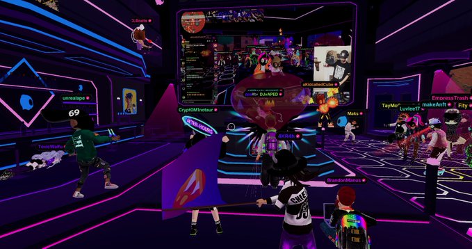 The image shows a vibrant virtual nightclub scene in Decentraland, where avatar crowds gather in a neon-lit venue with the text "BEAST MODE" displayed on a large screen, alongside usernames like "SinfulMeat," "TayMc," and "EmpressTrash," as an announcer commands "The Stage Is Yours!" in front of the lively audience.