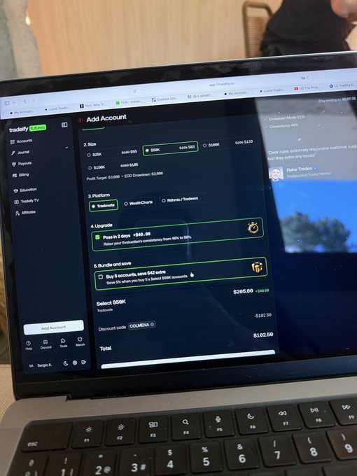 A laptop screen displays a Tradelly account upgrade page, with the $60K option selected, showing bundles and a discount code 'COIMENA' applied for a total of $102.50.