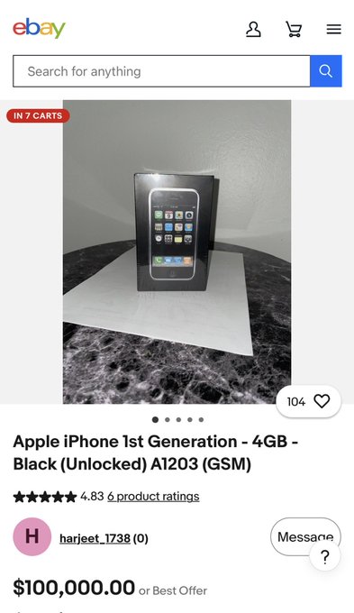An eBay listing for an "Apple iPhone 1st Generation - 4GB - Black (Unlocked) A1203 (GSM)" priced at $100,000.00, showing the boxed device and seller "harjeet_1738" with a 4.83 rating from 6 product ratings.