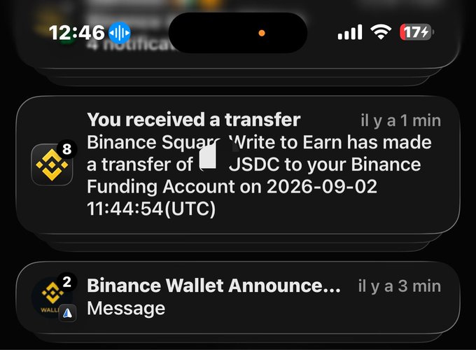 An iPhone notification screen showing Binance Square 'Write to Earn' has made a transfer of USDC to the user's Binance Funding Account.