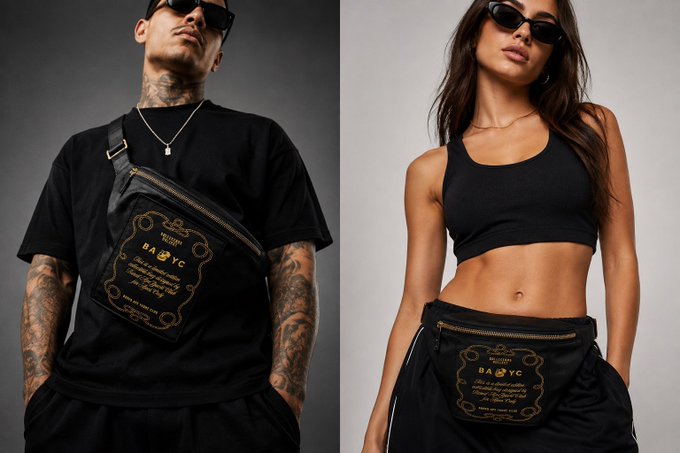 A man and woman model black streetwear featuring "BA♠YC" branded apparel, with the man in a crossbody sling bag and the woman in a cropped tank top and track pants. The "Members Only" message aligns with the exclusive black and gold branding, emphasizing a private, membership-based access to the collection.