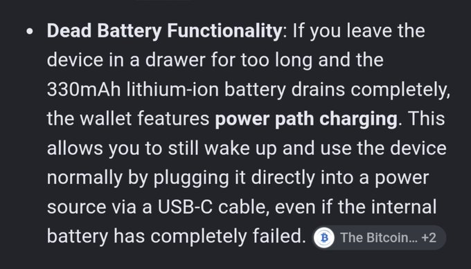 A text slide titled "Dead Battery Functionality" explaining that a 330mAh lithium-ion battery can be powered via a USB-C cable, with a small Bitcoin label at the bottom.