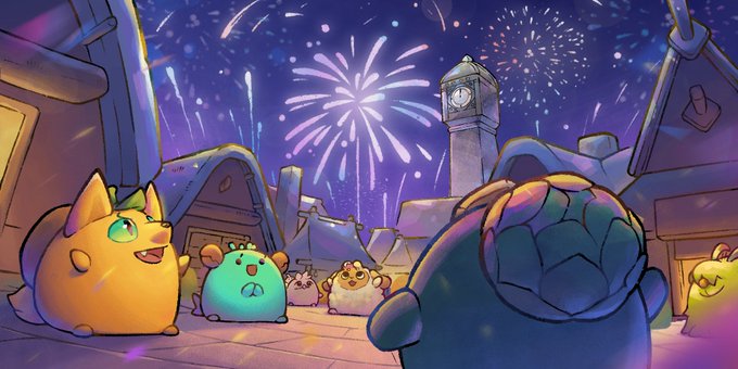 A group of adorable Axie Infinity characters gathers in a snowy village square, gazing up at a spectacular fireworks display lighting up the night sky above a clock tower. The festive scene perfectly captures the 4th of July spirit being celebrated by Lunacians in the USA, blending holiday cheer with the charm of the game's beloved creatures.